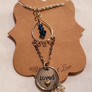 Blue gem necklace with love pendant